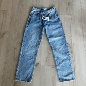 Women’s asymmetric blue jeans